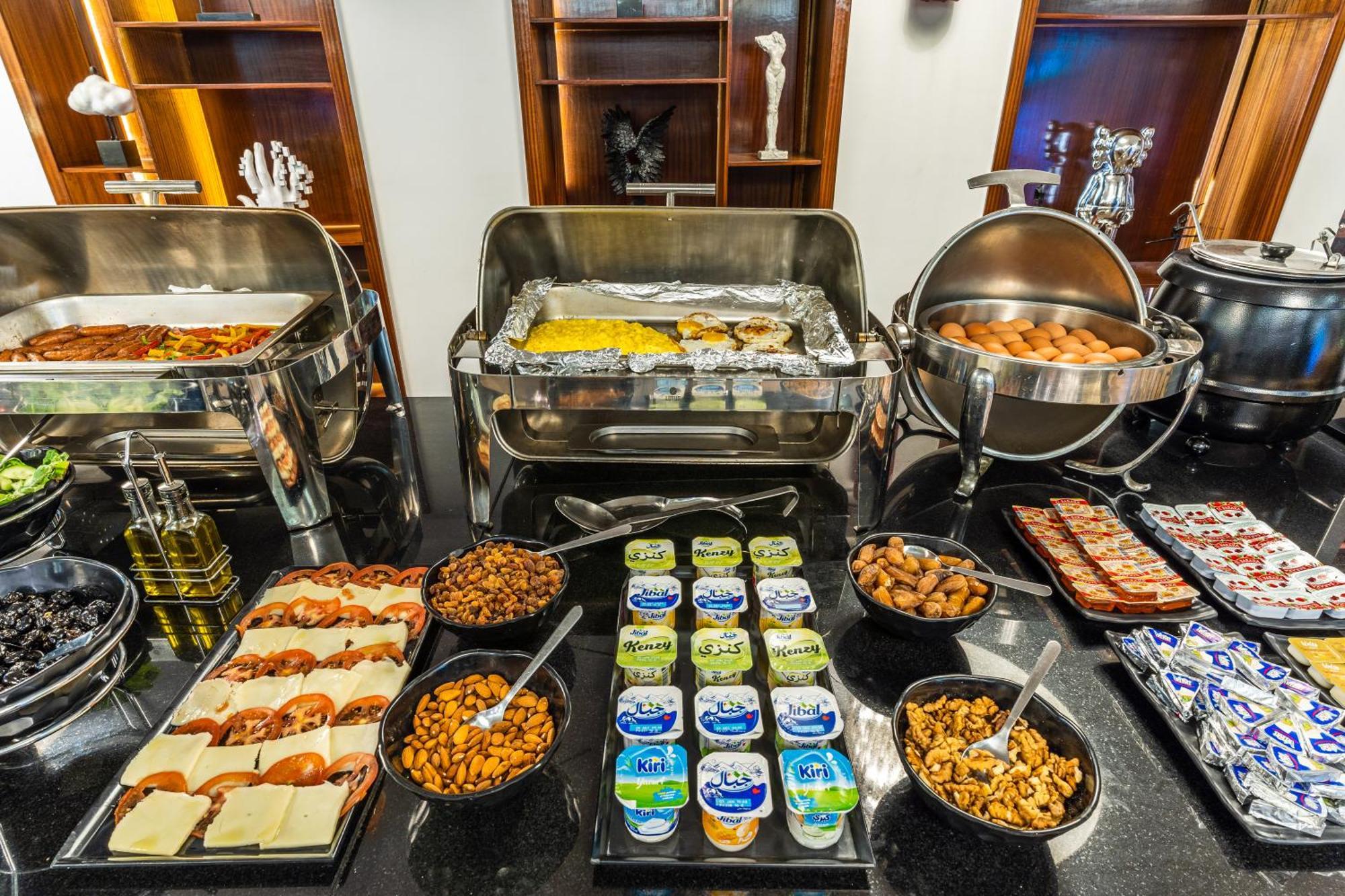 One Hotel Casablanca Exteriör bild A breakfast buffet at a hotel